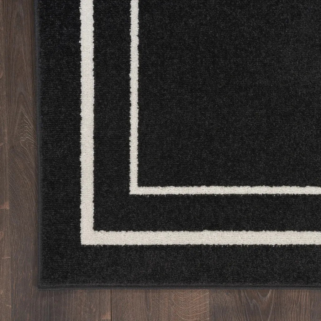 6' X 9' Black And Ivory Indoor Outdoor Area Rug Homeroots Outdoor