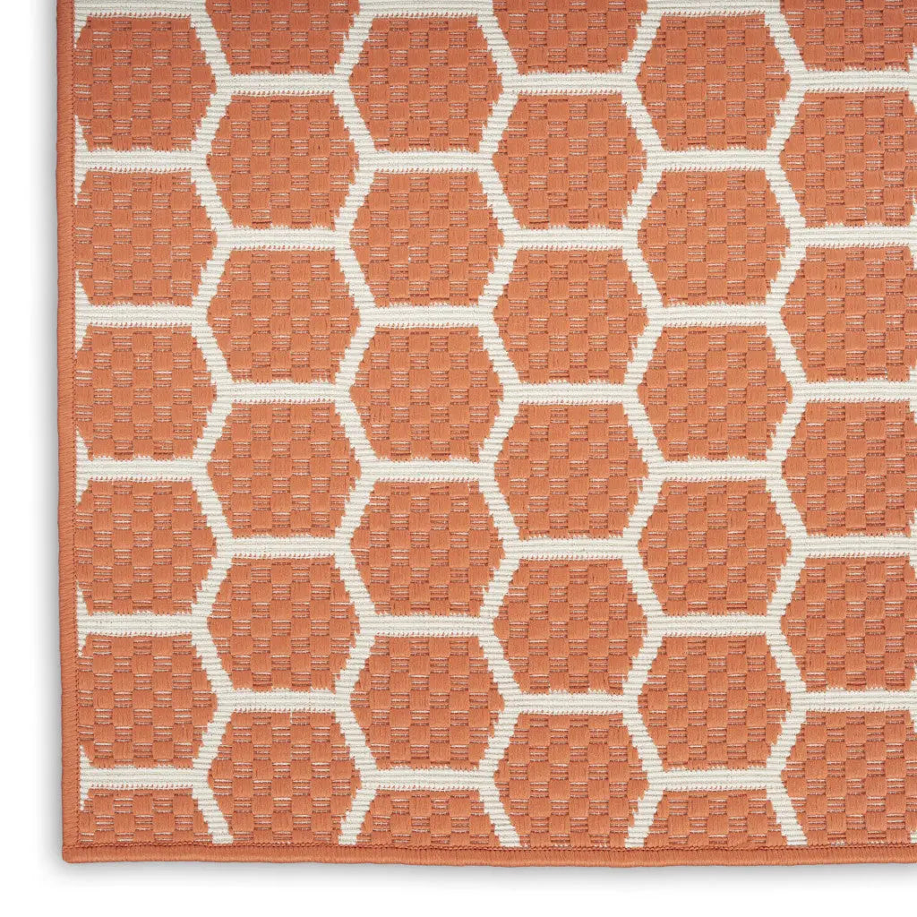 6' X 9' Coral And Ivory Geometric Indoor Outdoor Area Rug - GreatEagleInc