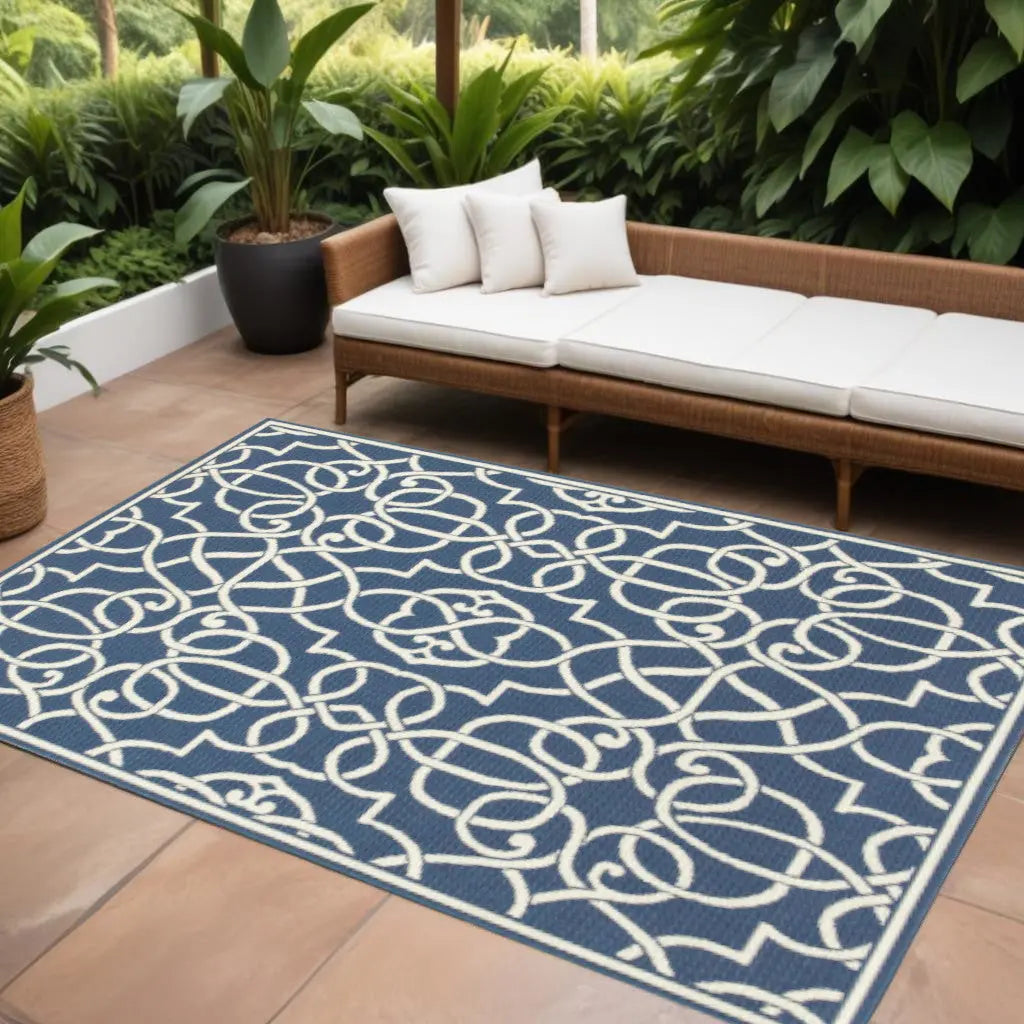 7' X 10' Blue and Ivory Geometric Stain Resistant Indoor Outdoor Area Rug Homeroots Outdoor