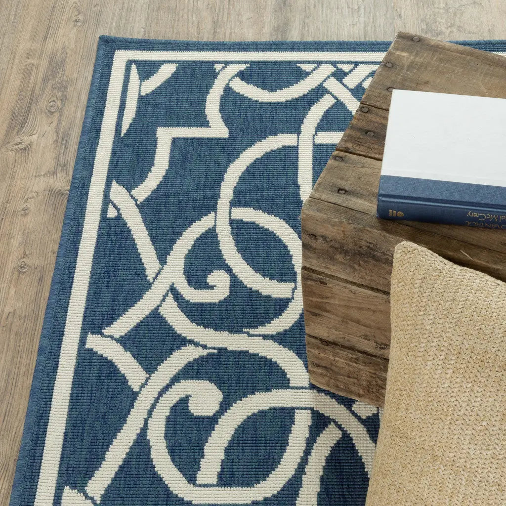 7' X 10' Blue and Ivory Geometric Stain Resistant Indoor Outdoor Area Rug Homeroots Outdoor
