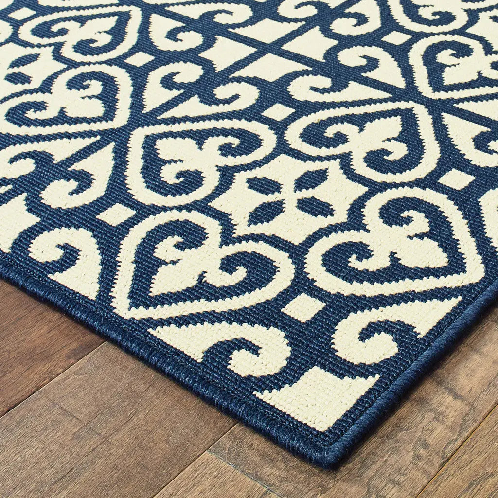 7' X 10' Ivory and Blue Geometric Stain Resistant Indoor Outdoor Area Rug Homeroots Outdoor
