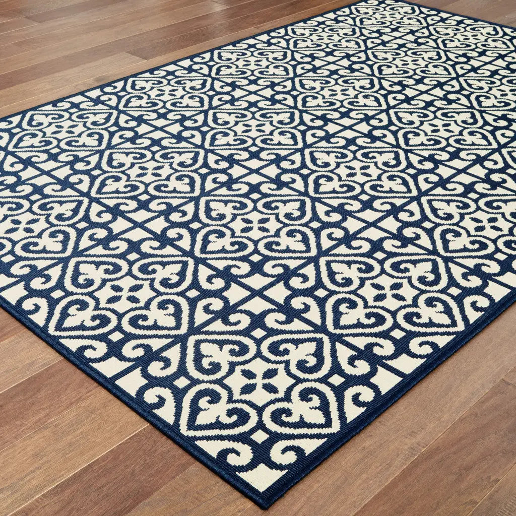 7' X 10' Ivory and Blue Geometric Stain Resistant Indoor Outdoor Area Rug Homeroots Outdoor