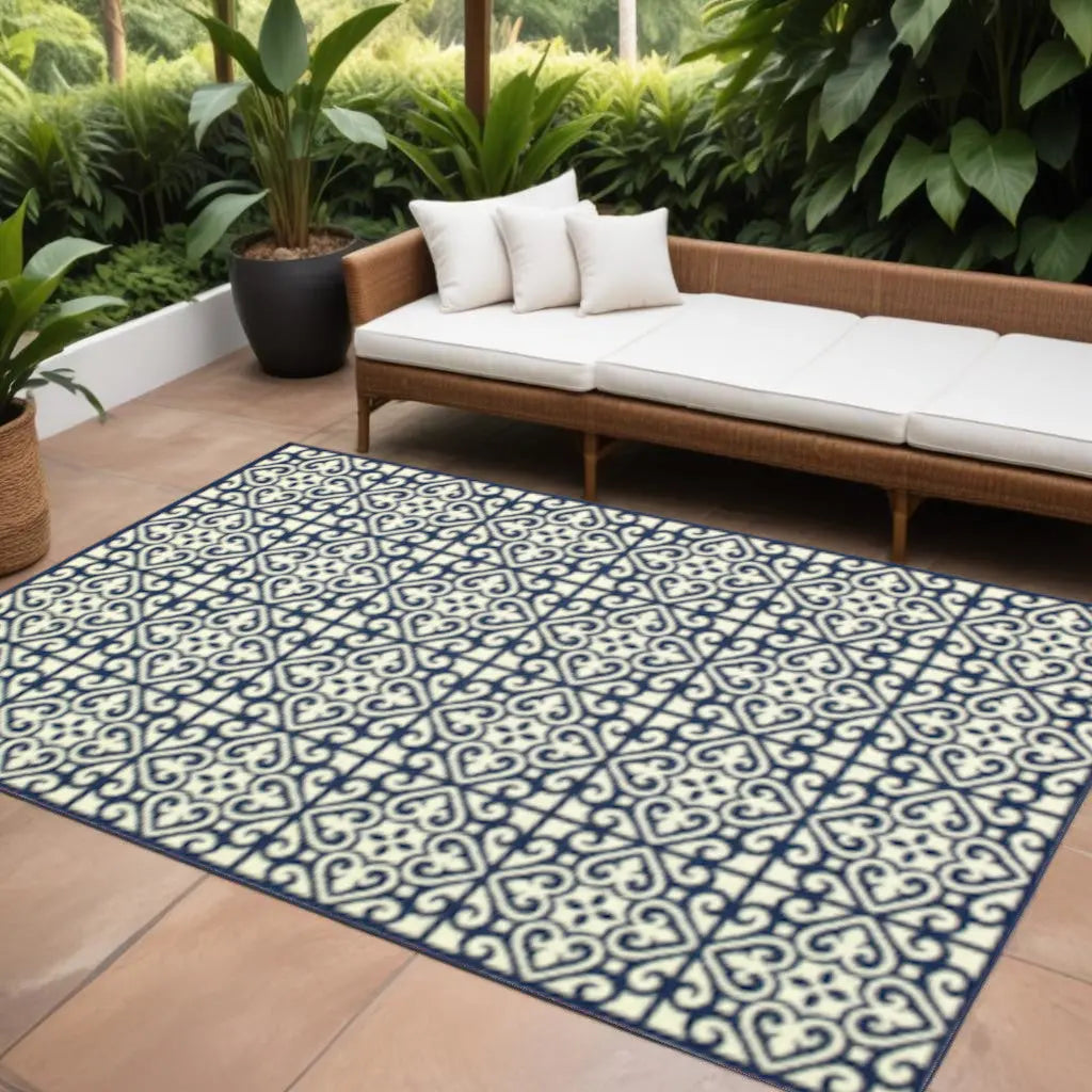 7' X 10' Ivory and Blue Geometric Stain Resistant Indoor Outdoor Area Rug Homeroots Outdoor