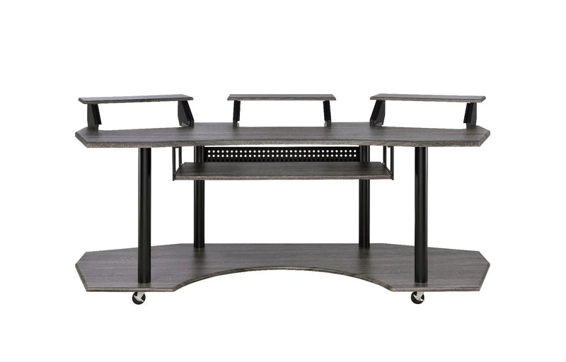 Gray wood TV stand with black metal accents and wheels, featuring adjustable shelves and a modern design.