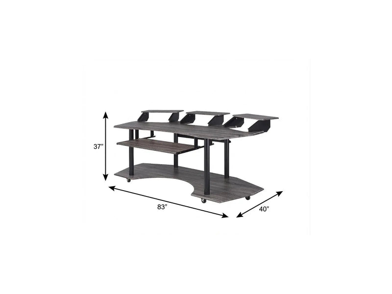 Modern gray wood computer desk with three monitor stands, metal legs, and rolling casters, dimensions 83" x 40", height 37".