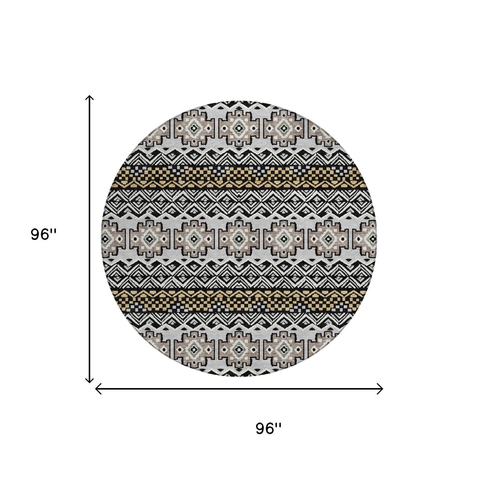Round 96" area rug with intricate black, white, and gold geometric patterns in durable, stylish fabric.