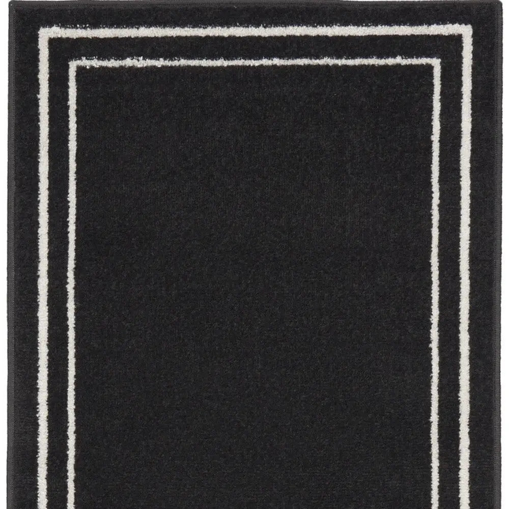 8' Black And Ivory Indoor Outdoor Runner Rug Homeroots Outdoor