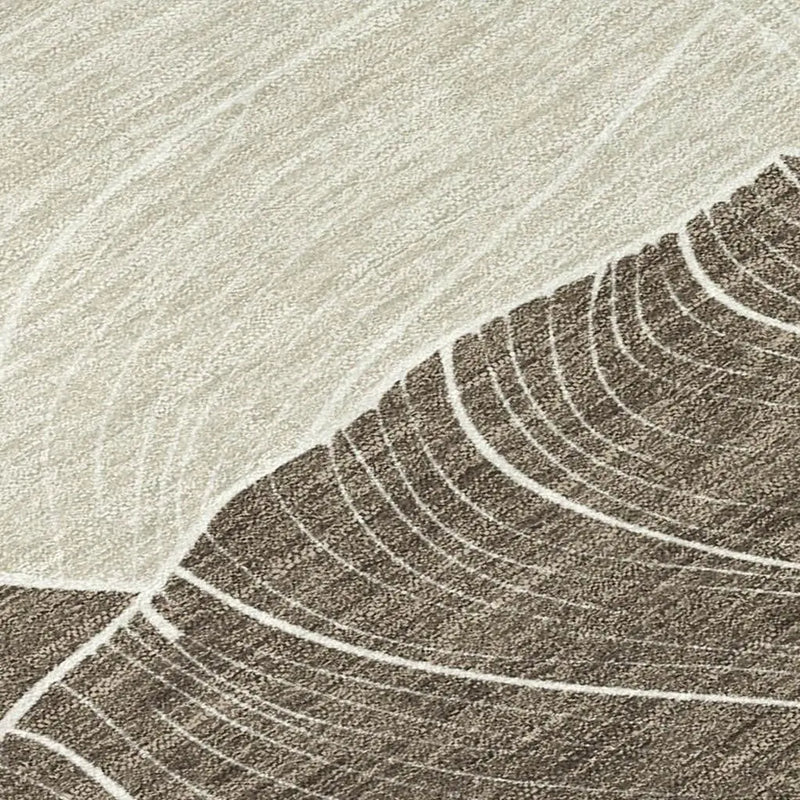 Beige and brown abstract area rug with textured lines, perfect for modern home decor.