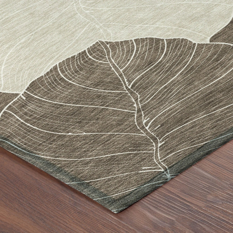 Beige and brown area rug with leaf design, textured fabric, perfect for modern home decor.