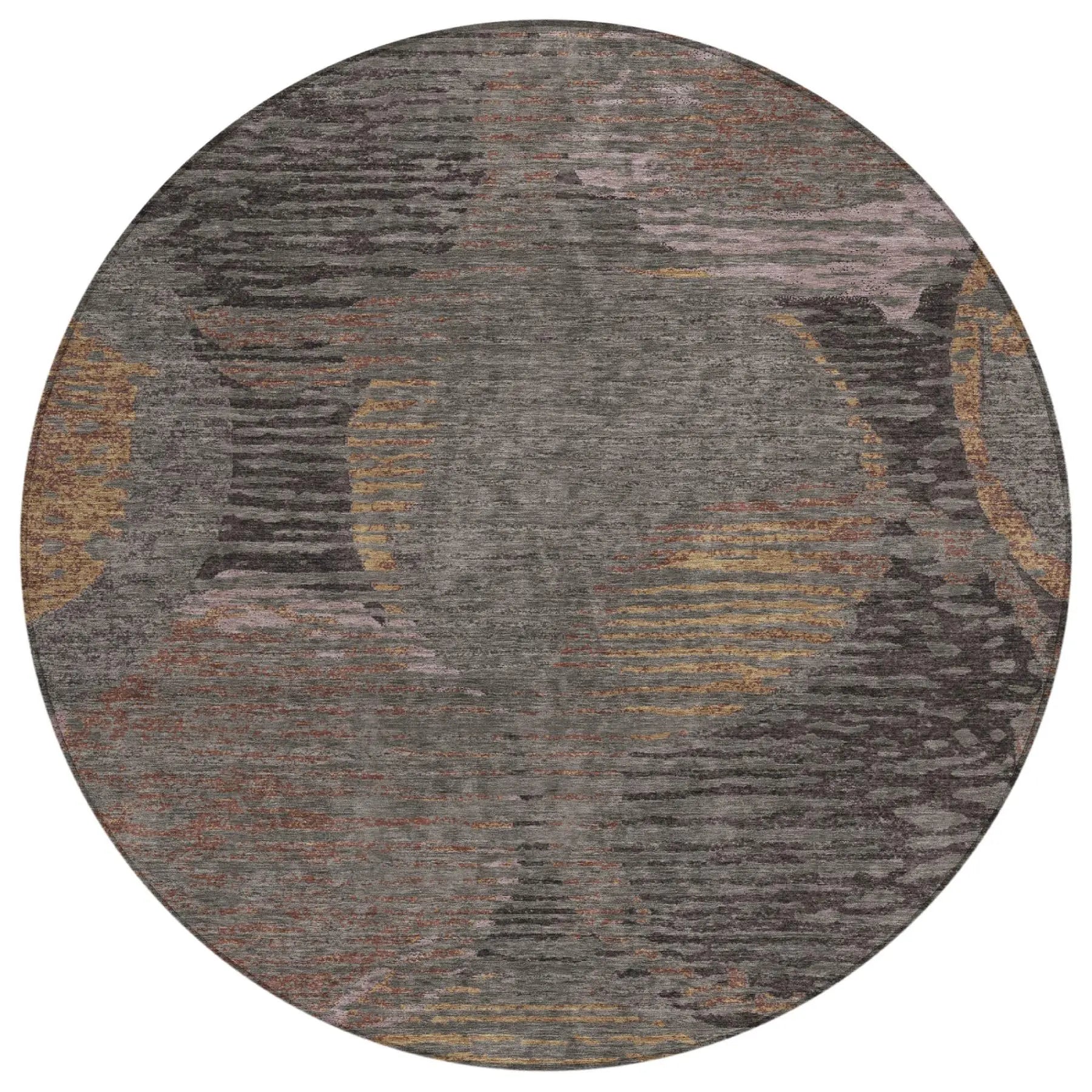 Round gray area rug with abstract patterns in muted tones of brown, orange, and purple, made from soft synthetic fibers.