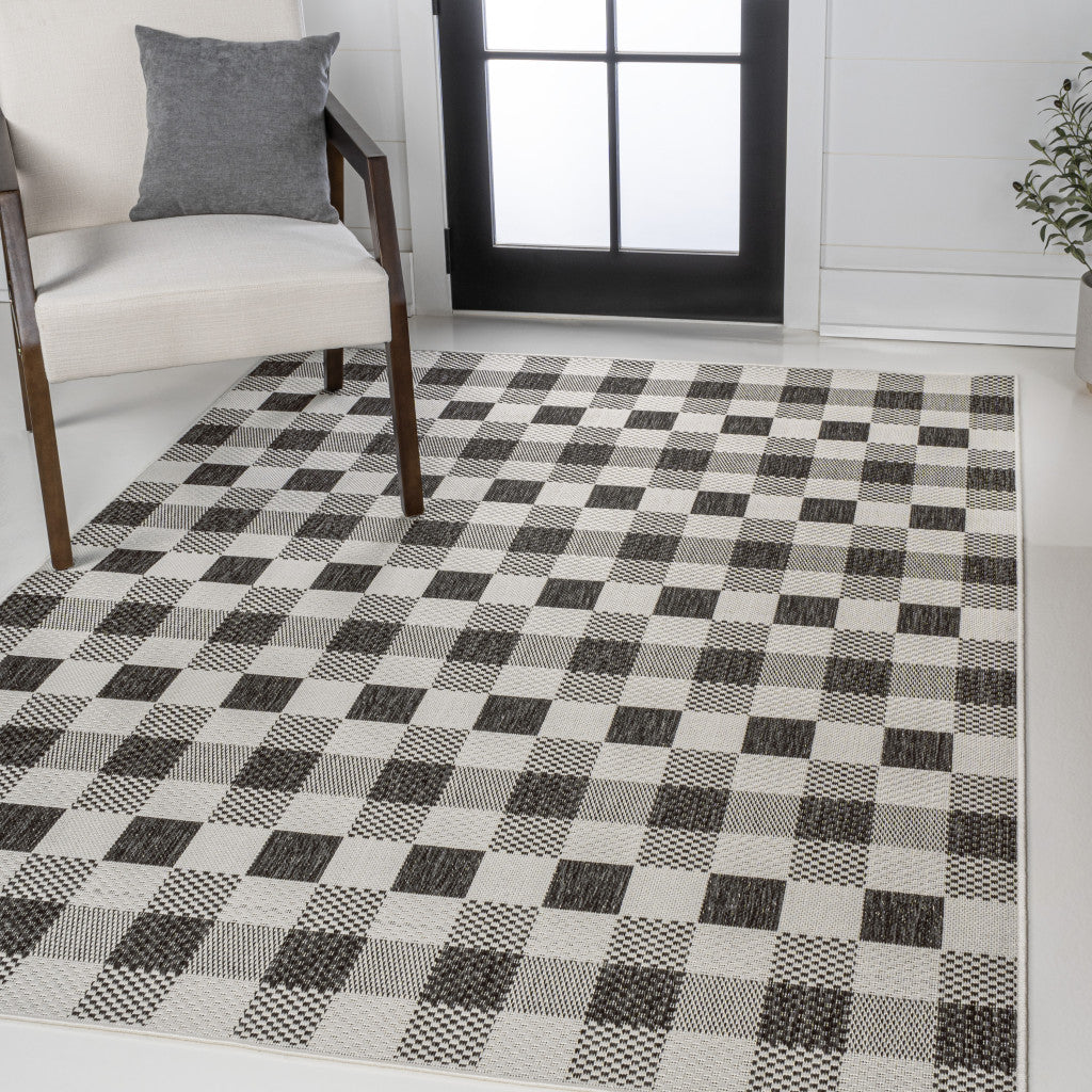 8' X 10' Black And Cream Geometric Indoor Outdoor Area Rug - GreatEagleInc