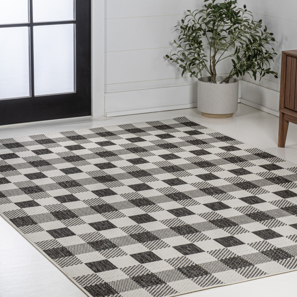 8' X 10' Black And Cream Geometric Indoor Outdoor Area Rug - GreatEagleInc