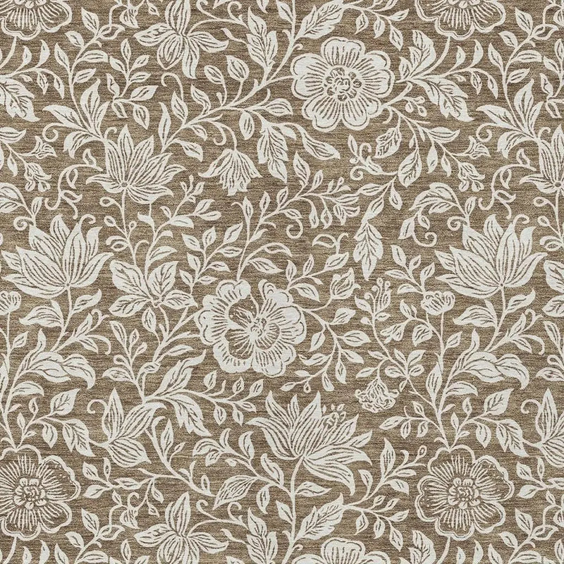 Beige floral linen fabric with white intricate designs, perfect for upholstery or drapery.