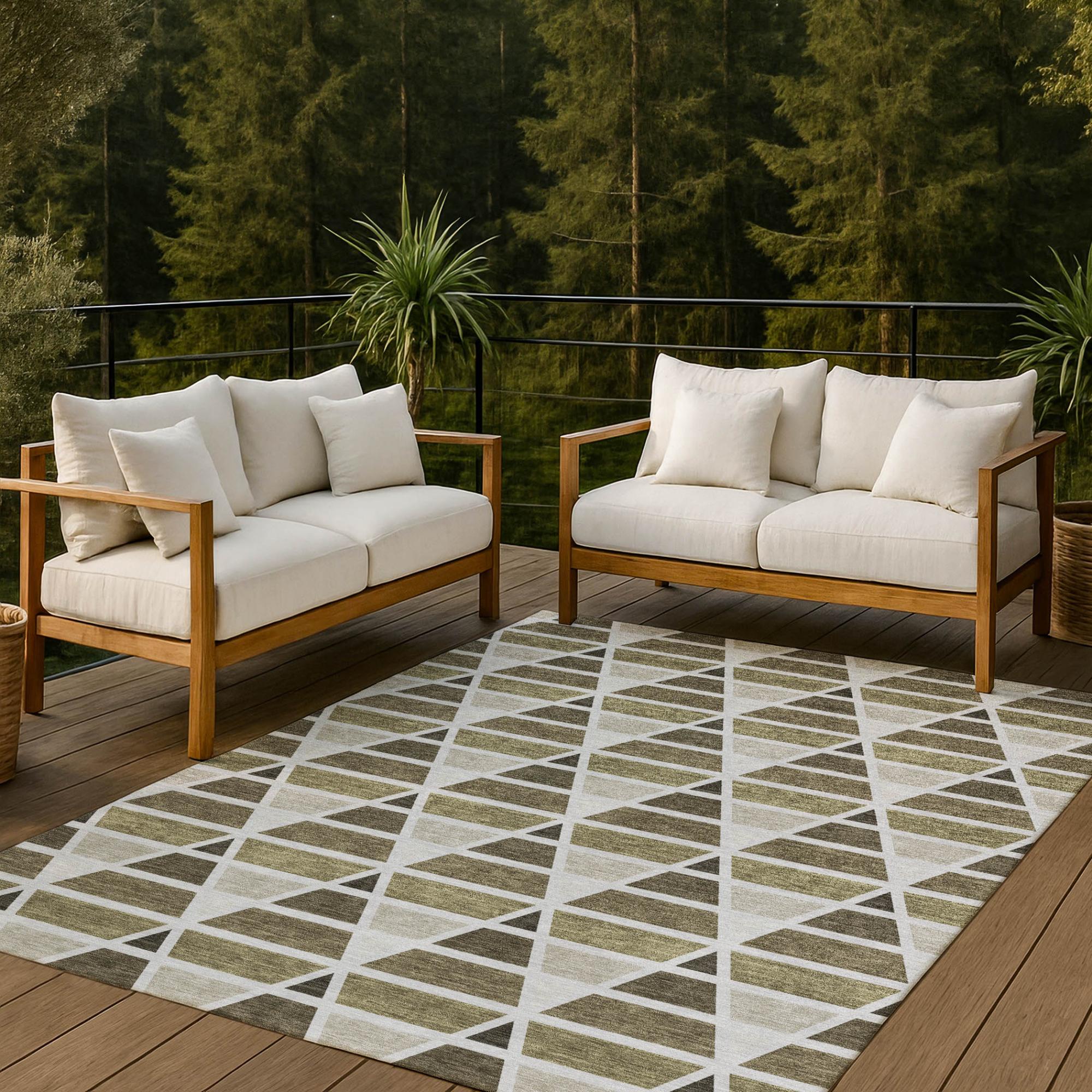 Beige outdoor sofa set with wooden frame and plush cushions, paired with a geometric gray and white area rug.