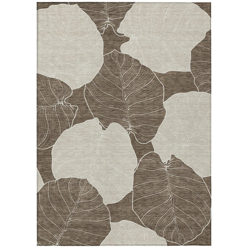 Beige and brown area rug with large white leaf patterns, perfect for modern and minimalist decor.