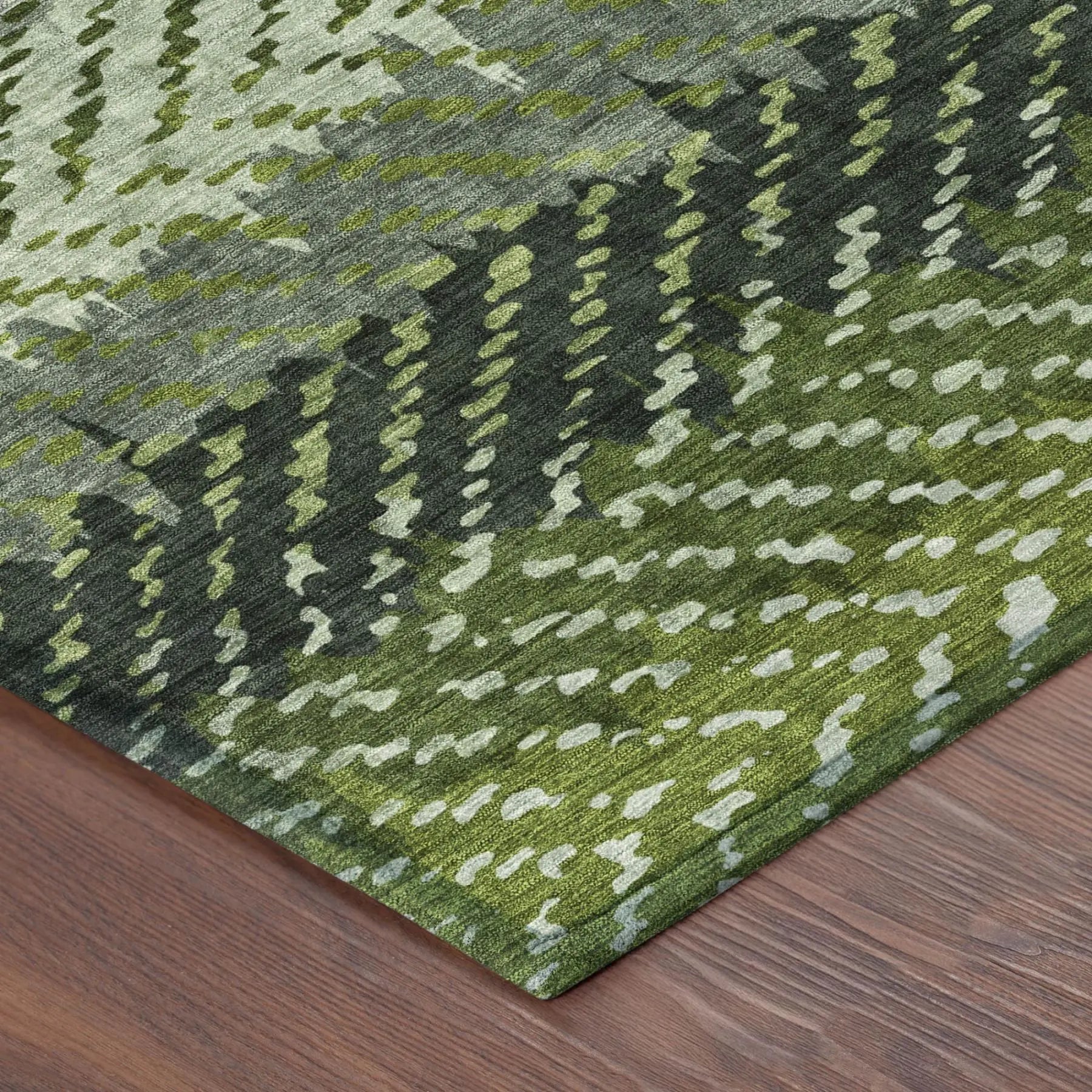 Abstract green area rug in various shades, made of soft polyester, adding a modern touch to your living space.