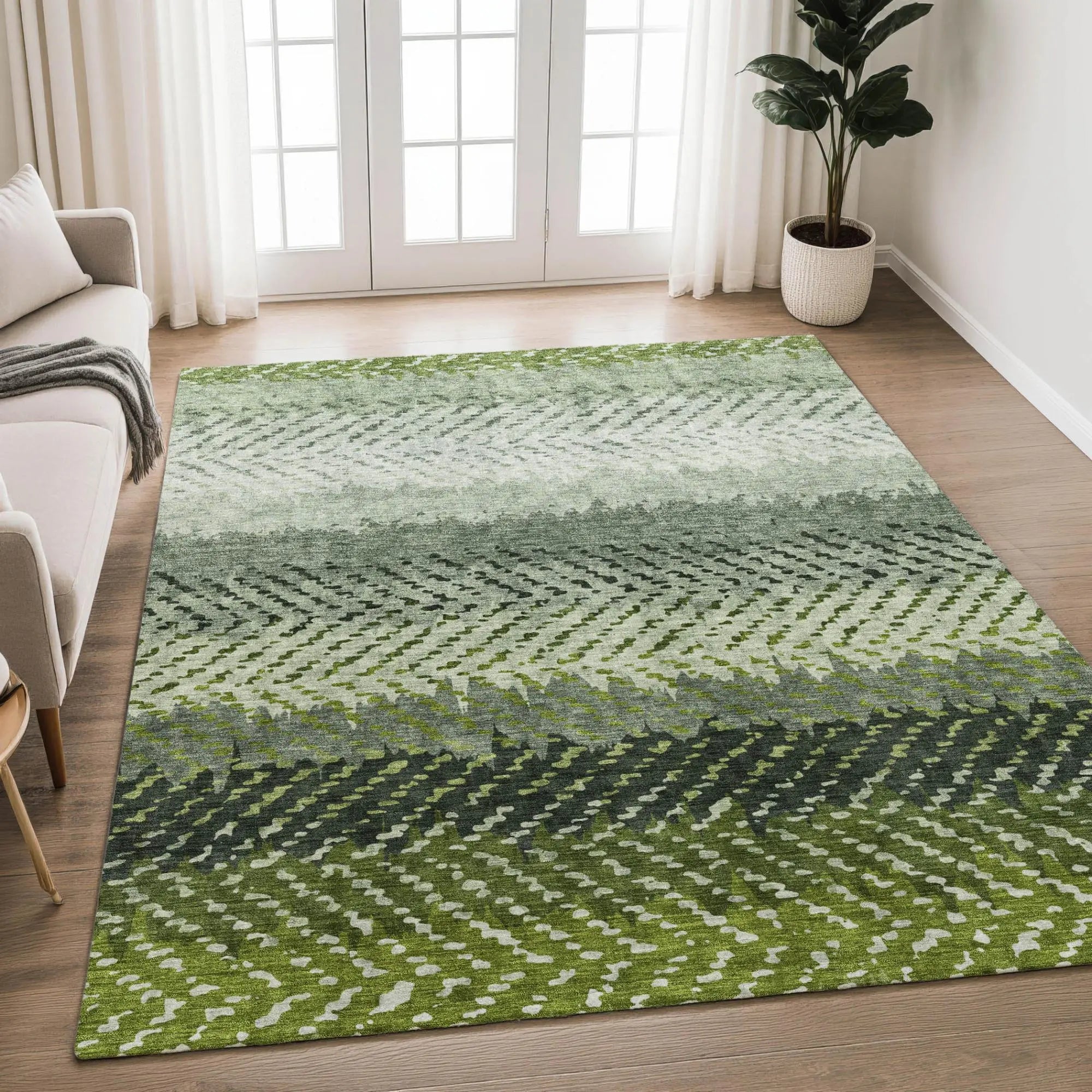 Green geometric area rug in varying shades, made of soft, durable fibers, perfect for modern living spaces.