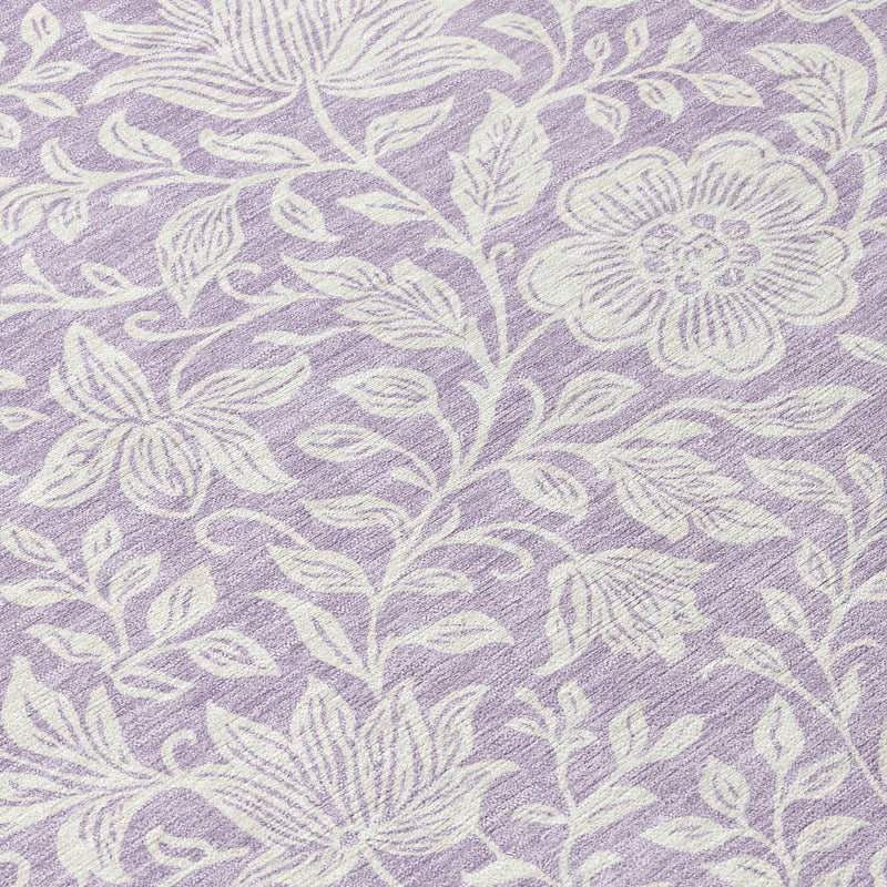 Purple floral patterned fabric with white intricate designs, perfect for home decor and upholstery.