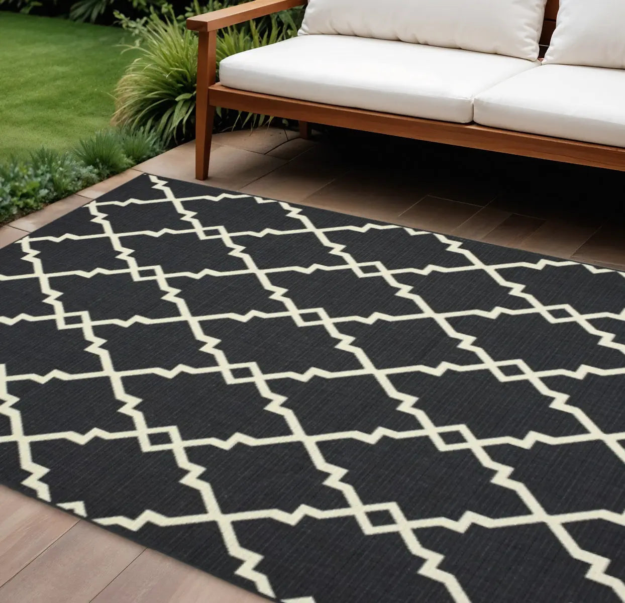 8' X 11' Black And Ivory Indoor Outdoor Area Rug Homeroots Outdoor