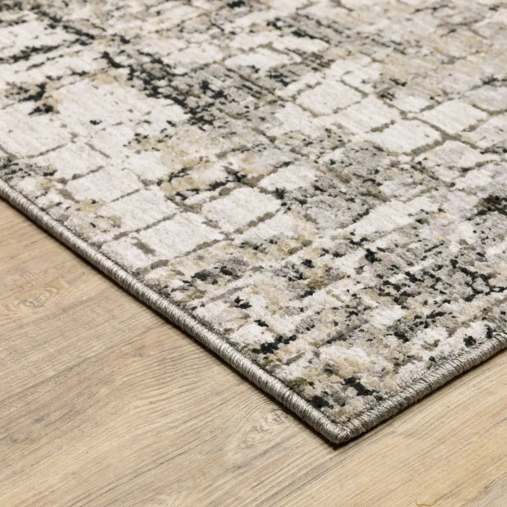 8' X 11' Grey Ivory Beige Charcoal Black Tan And Brown Abstract Power Loom Stain Resistant Area Rug Homeroots Home Decor