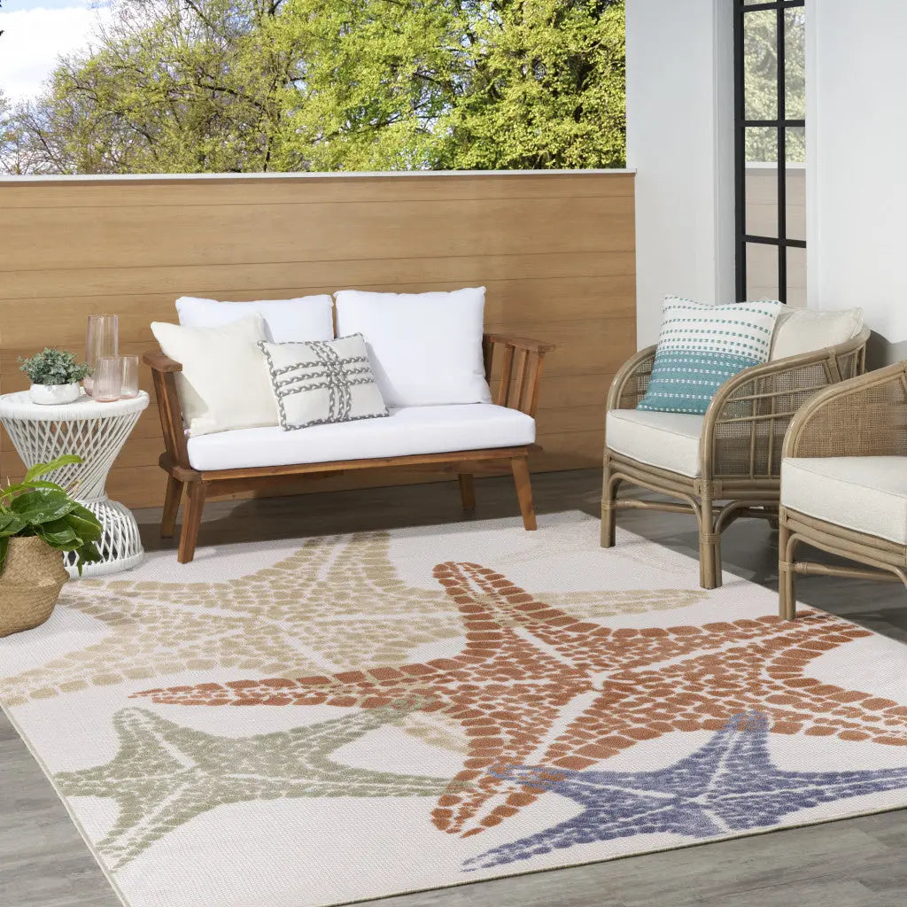8' X 11' Ivory Yellow Orange And Green Starfish Indoor Outdoor Area Rug Homeroots Outdoor
