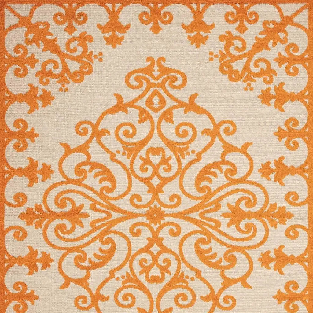 8' X 11' Orange And Ivory Damask Indoor Outdoor Area Rug - GreatEagleInc