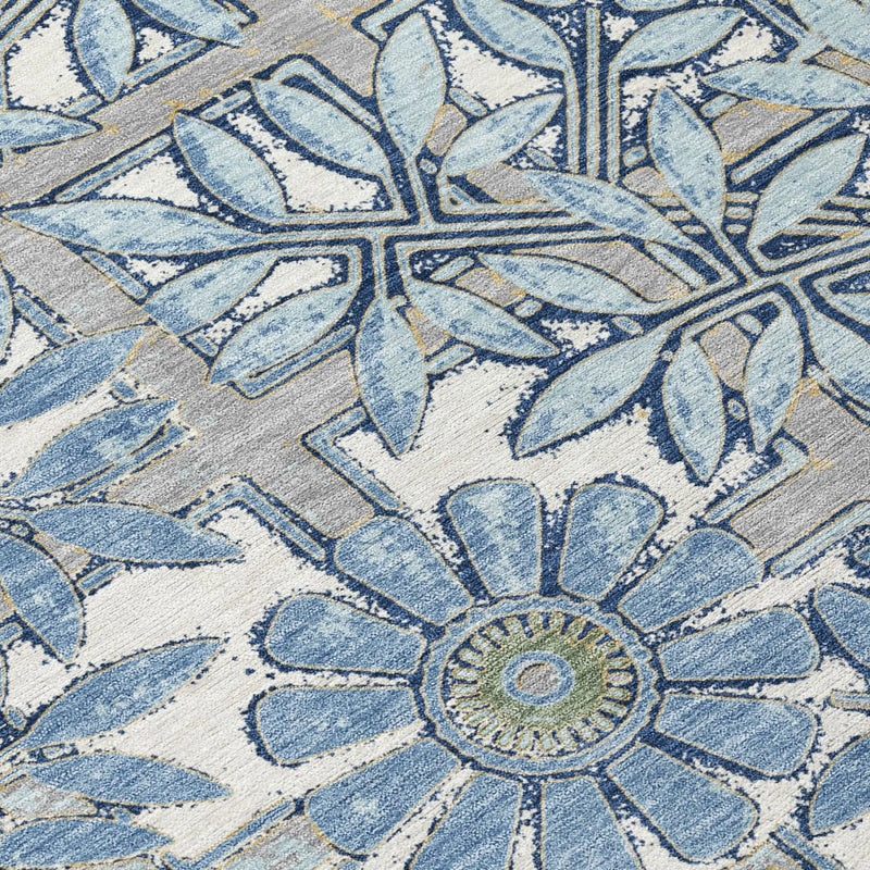 Blue and white floral patterned area rug, featuring intricate designs and a soft, durable material.