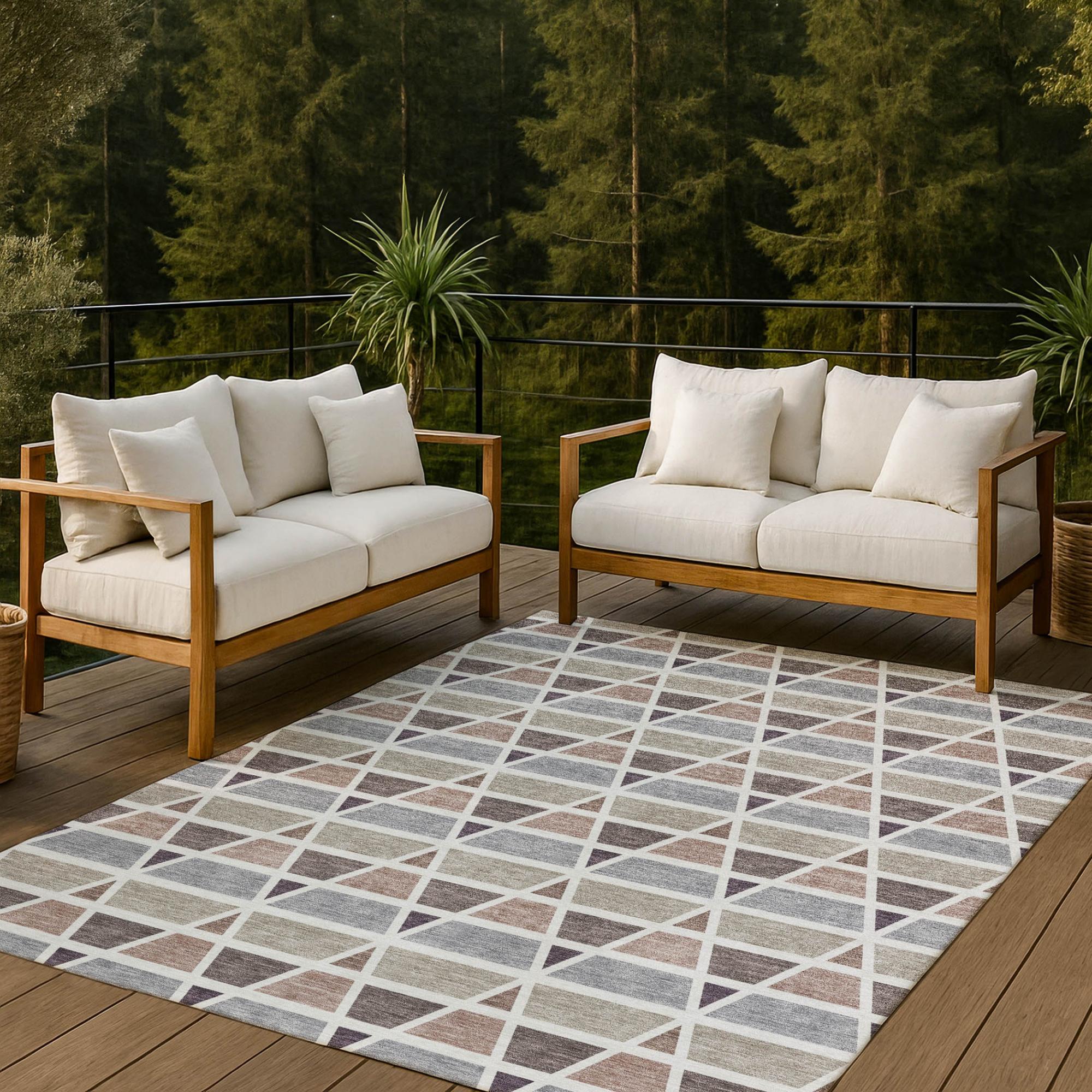 Neutral geometric area rug, featuring soft gray, beige, and brown tones, perfect for outdoor patio decor.
