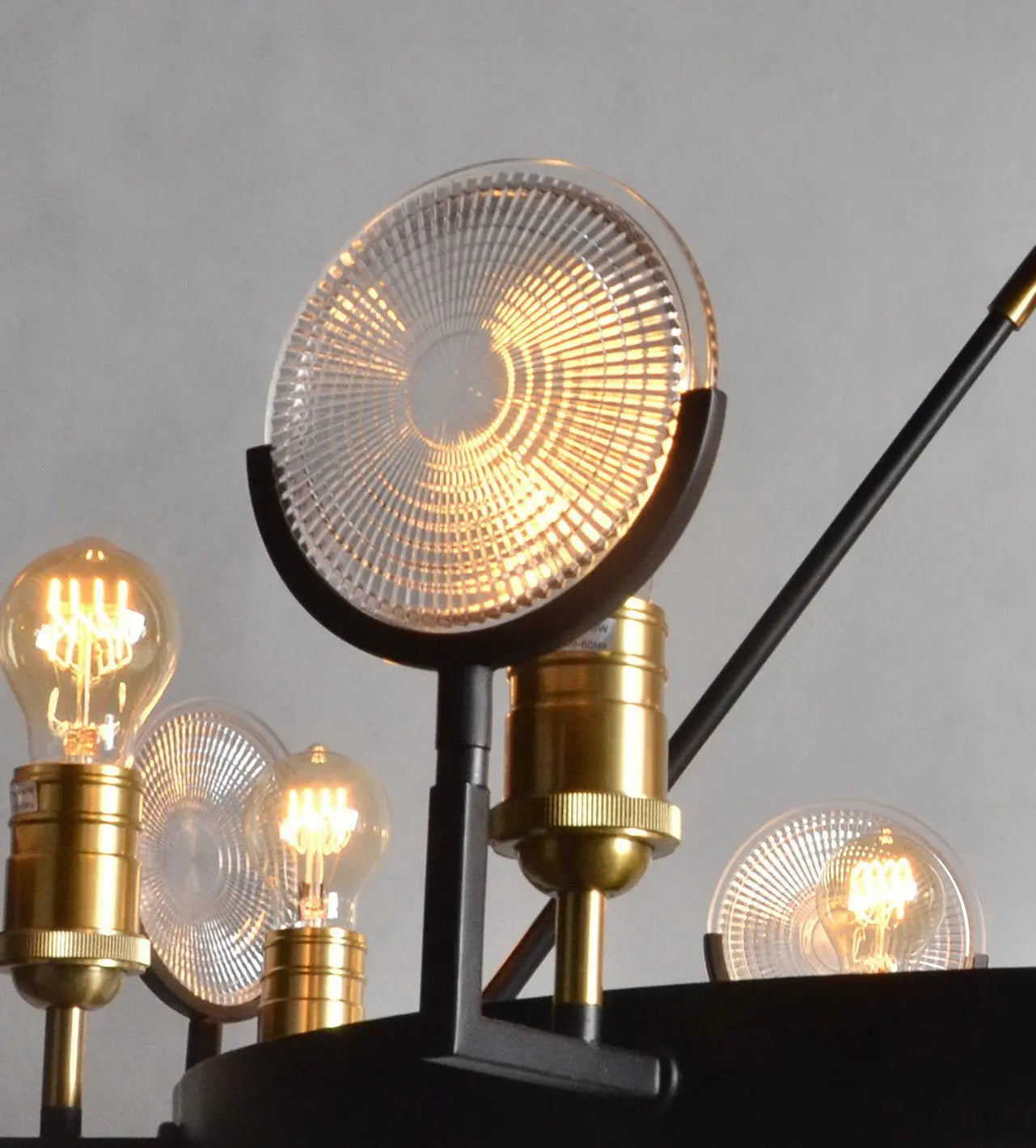 Black And Gold Unique Statement Eight Light Metal Chandelier With Clear Shades Homeroots Lighting