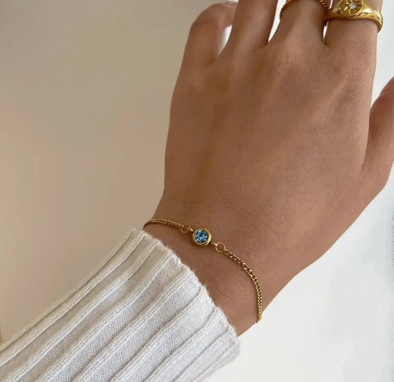 DELILAH GOLD DAINTY BLUE TOPAZ BIRTHSTONE BRACELET - DECEMBER Mai Desiree