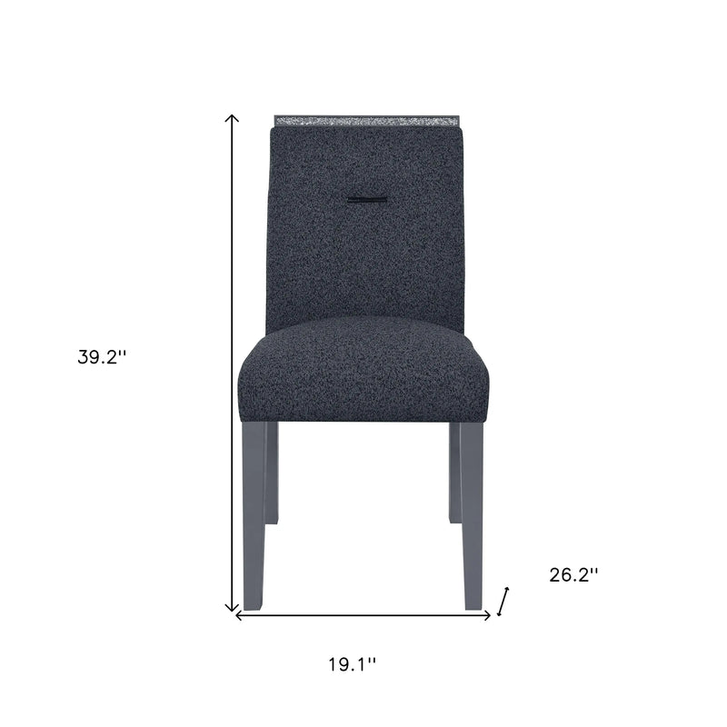 Modern gray upholstered dining chair with a sleek design and sturdy wooden legs, measuring 39.2" H x 19.1" W x 26.2" D.