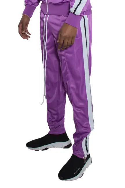 Men's purple tracksuit pants with white side stripes, made from a lightweight, stretchy material. Perfect for activewear.
