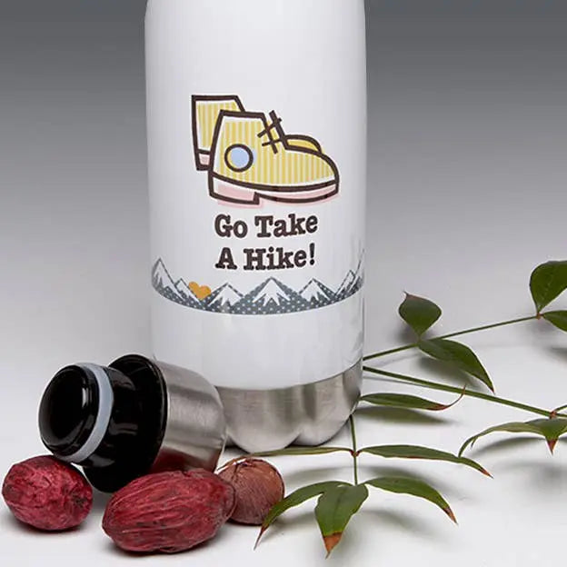 White stainless steel water bottle with hiking boot design, "Go Take A Hike!" text, and silver base.
