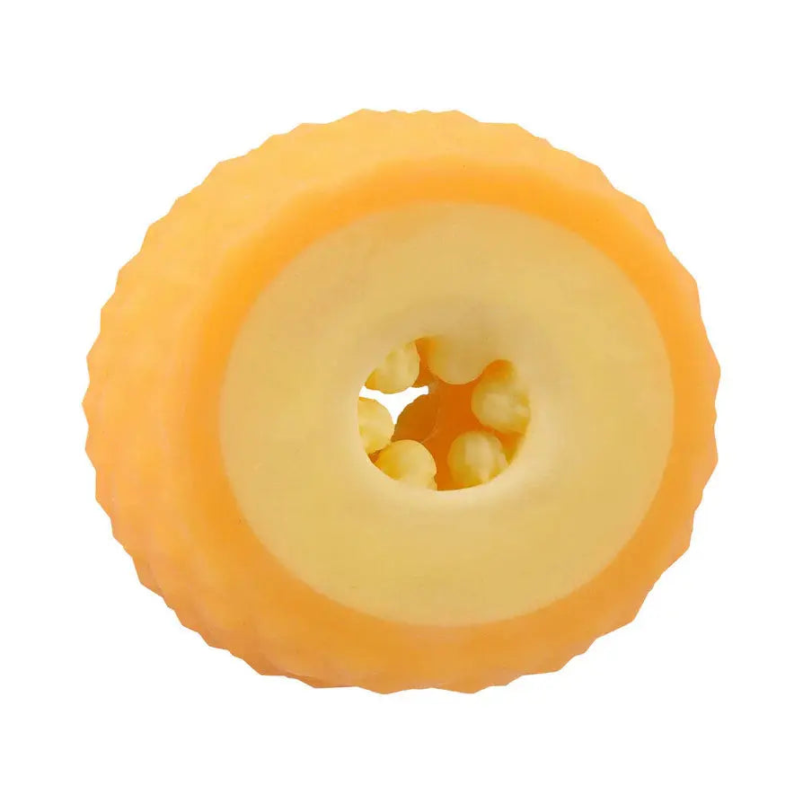 Round yellow silicone cake mold with textured exterior and central hole for creative baking projects.