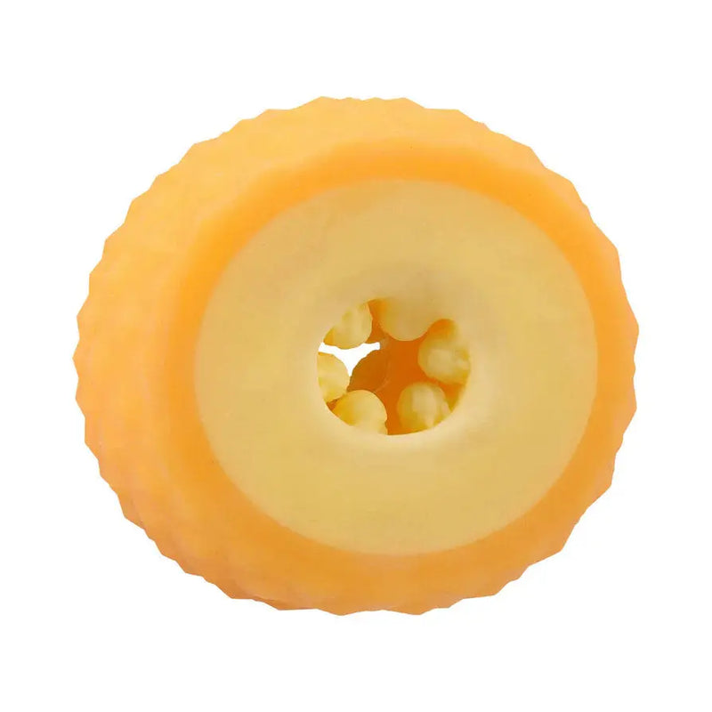 Round yellow silicone cake mold with textured exterior and central hole for creative baking projects.