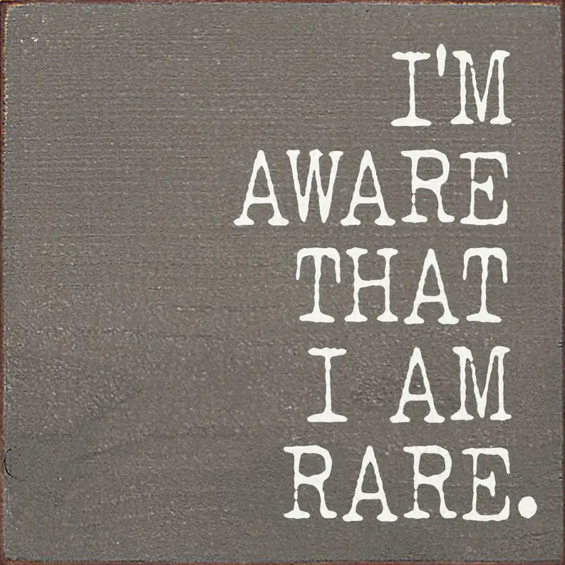 I'm aware that I am rare wood sign Sawdust City
