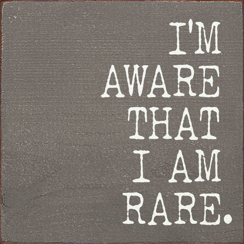 I'm aware that I am rare wood sign Sawdust City