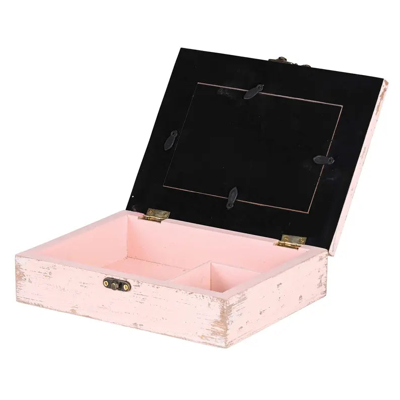 Vintage pink wooden storage box with black velvet interior and compartments for organization. Ideal for keepsakes or jewelry.