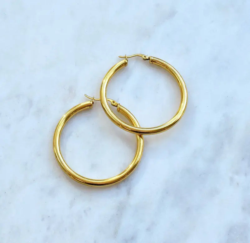 NIKKI LARGE GOLD HOOP EARRINGS Mai Desiree