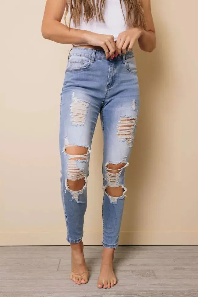 On The Harbor Distressed Skinny Jeans Stay Warm in Style