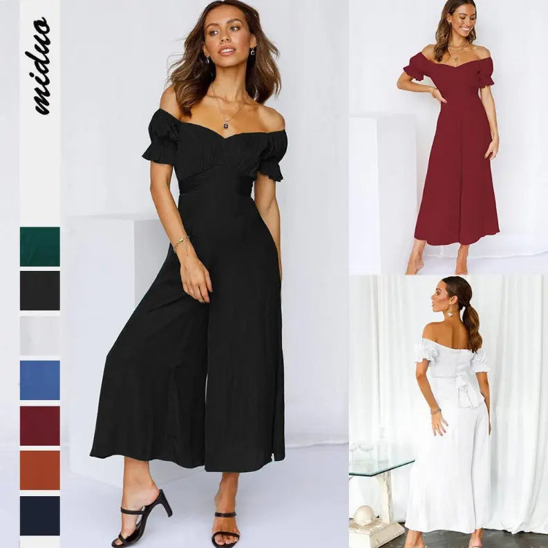 Off-shoulder midi jumpsuit in black, burgundy, and white; crafted from lightweight fabric with puff sleeves and a tie back.