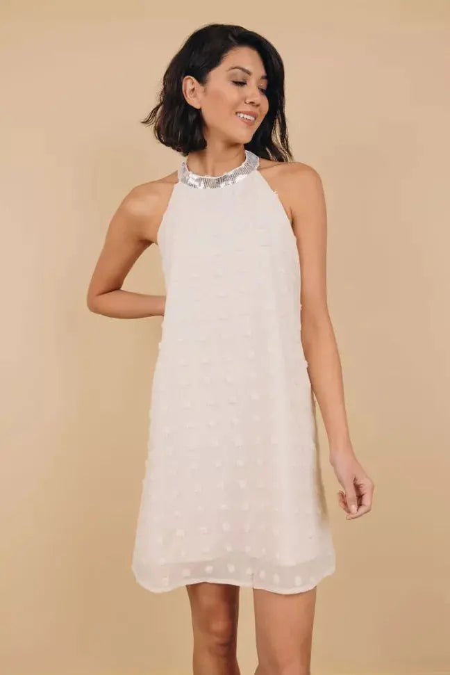 Raquel Sleeveless Pompom Mini Dress Stay Warm in Style