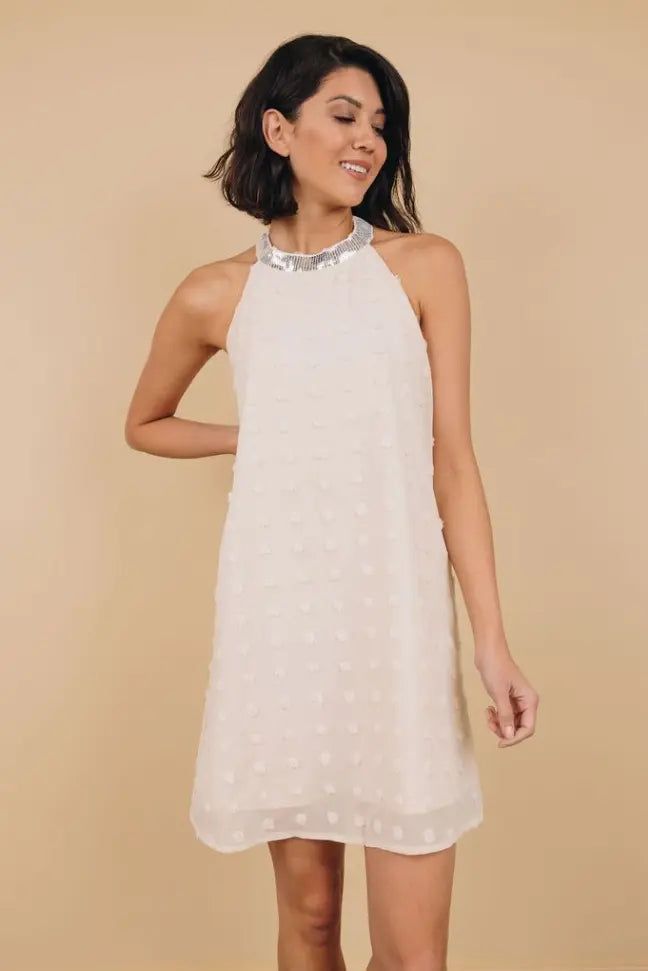 Raquel Sleeveless Pompom Mini Dress Stay Warm in Style