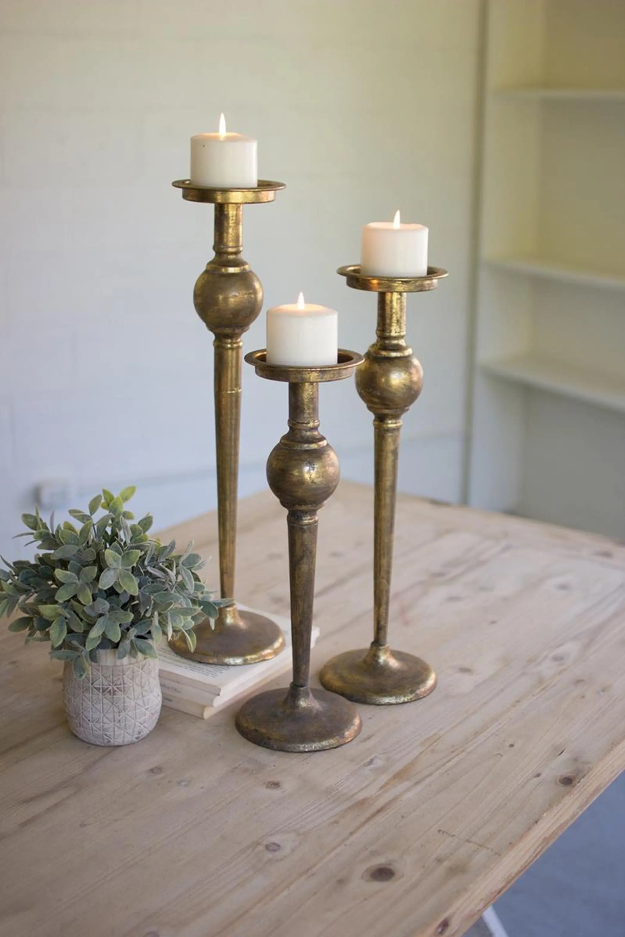 SET OF THREE ANTIQUE BRASS FINISH CANDLE STANDS Kalalou