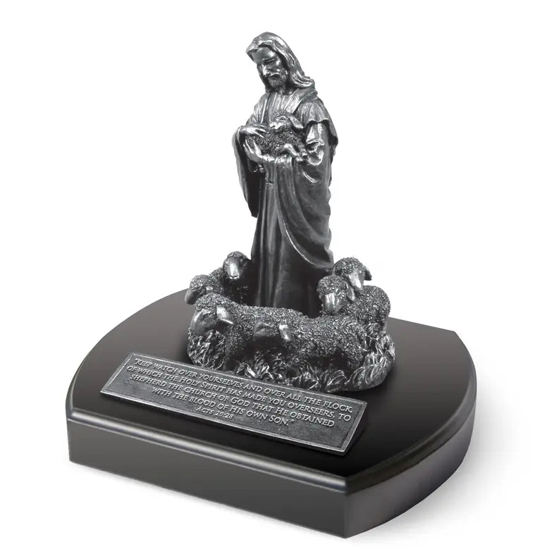 Bronze finish shepherd figurine with sheep on a black base, featuring an engraved motivational scripture plaque.