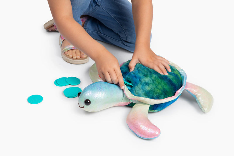 Colorful iridescent turtle plush toy with blue and green shell, perfect for interactive play and storage.