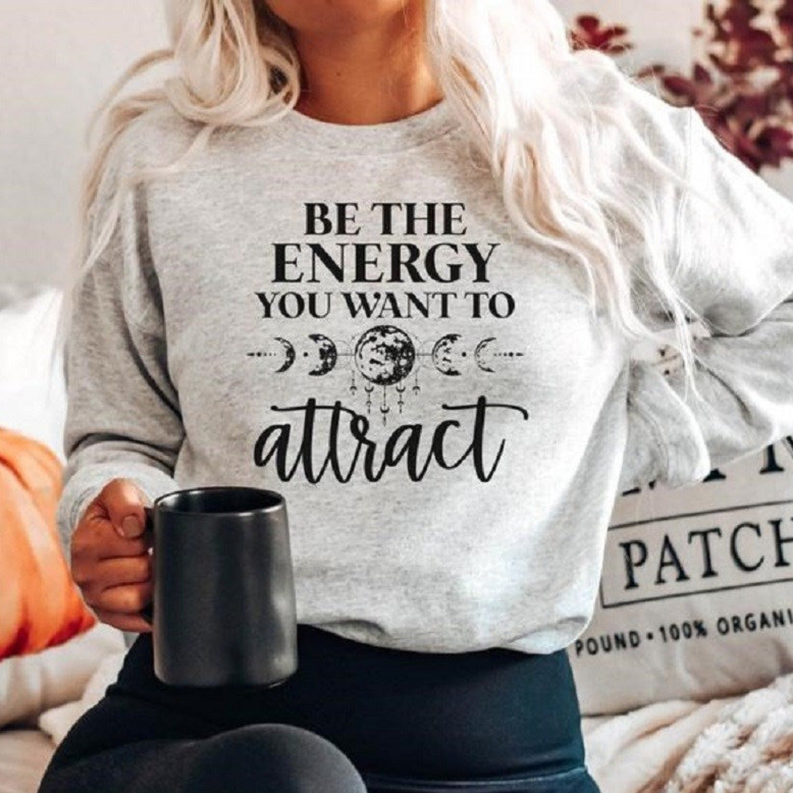 Women's Be The Energy You Want To Attract Sweatshirt Dream Team Designs