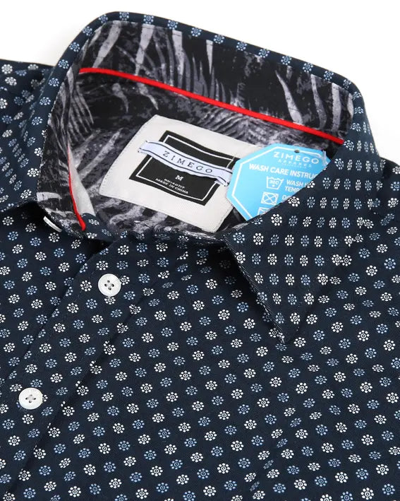 Navy floral print button-up shirt with contrasting collar and red detailing, perfect for casual or semi-formal wear.